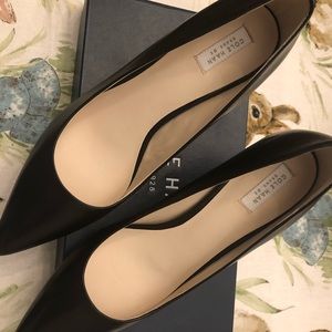 Cole Haan black leather heels new in box.
